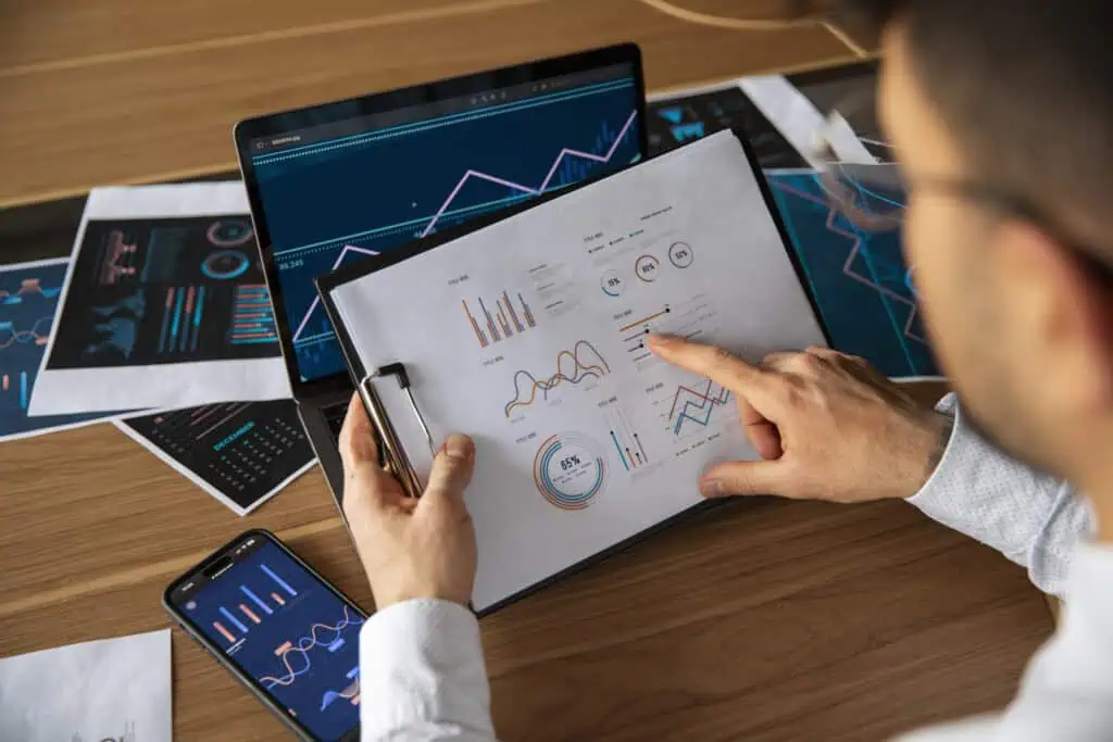 Office worker using graphs