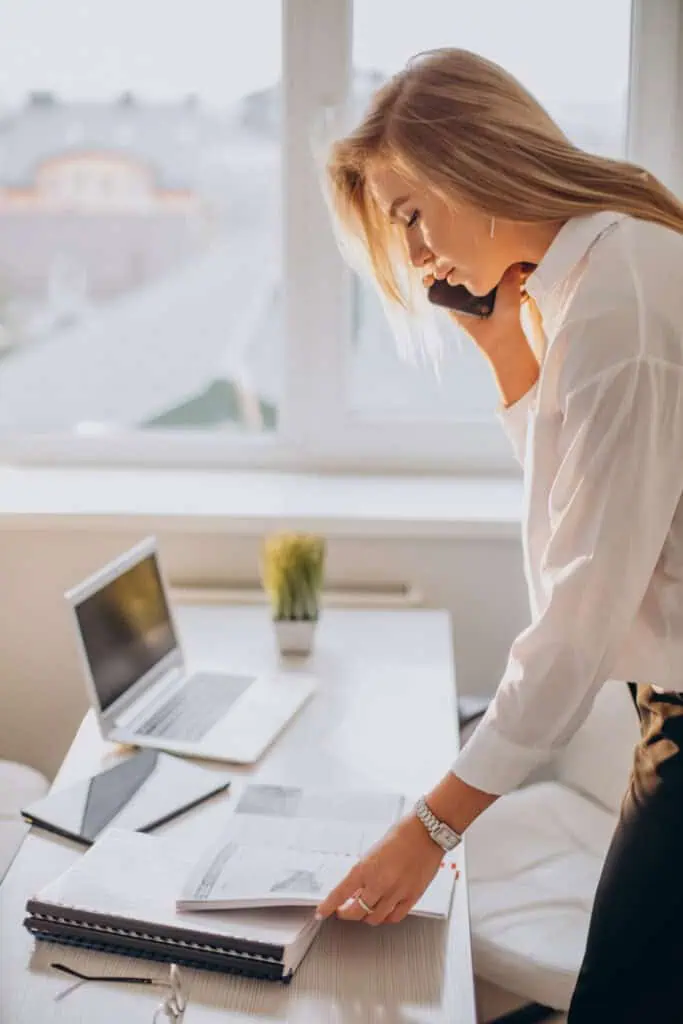 Business woman having phonecall at office